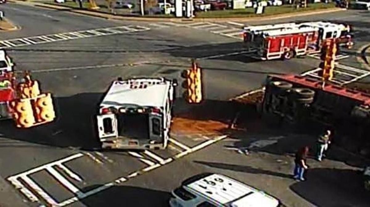 An overturned dump truck has closed South Boulevard near Westinghouse Boulevard on Thursday morning