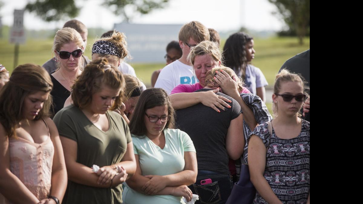 
Friends and family remember Sheyenne Marshall at a public vigil at Cox Mill High School on Sunday, July 5, 2014. Marshall was hit and killed by a boat on Lake Norman during Fourth of July celebrations. 
