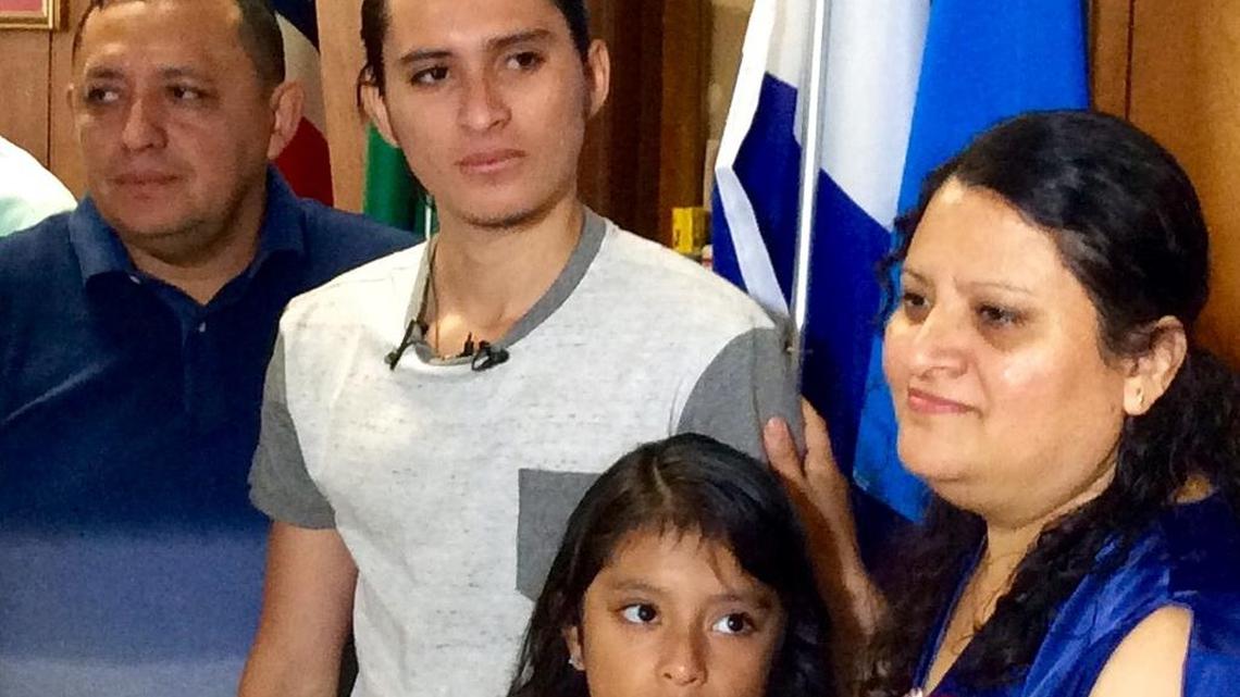 Charlotte immigrant teen Yefri Sorto-Hernandez (center) with his parents, Jose and Elsy Sorto-Hernandez, at Friday press conference.