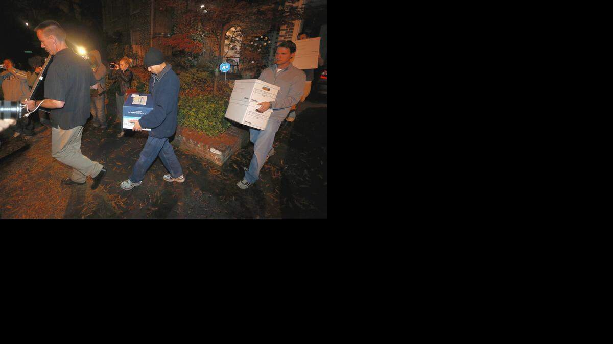 
FBI agents carry out boxes after searching the home of Paula Broadwell on Nov. 13, 2012, in the Dilworth neighborhood of Charlotte. 
