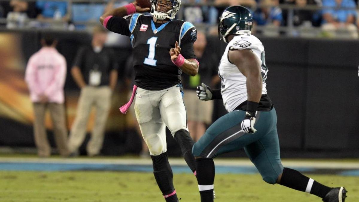 Carolina Panthers’ quarterback Cam Newton throws downfield as Fletcher Cox of the Philadelphia Eagles closes in at Bank of America Stadium in 2015. Cox is being sued for alienation of affection by Joshua Jeffords of Huntersville in Mecklenburg County Civil Court. Jeffords says Cox ruined his and his wife’s marriage, according to his lawsuit filed in November.