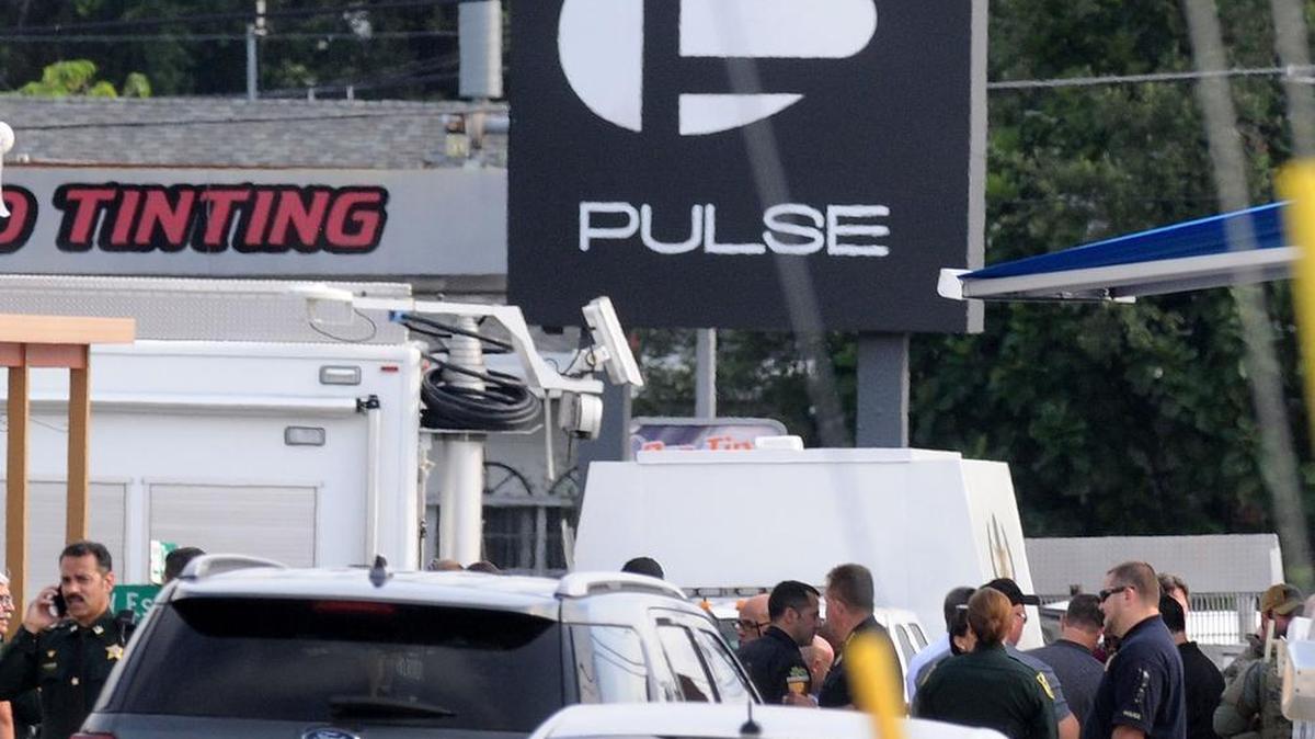 ORLANDO, FL - JUNE 12: Orlando police officers seen outside of Pulse nightclub after a fatal shooting and hostage situation on June 12, 2016 in Orlando, Florida. The suspect was shot and killed by police after 20 people died and 42 were injured. (Photo by Gerardo Mora/Getty Images)