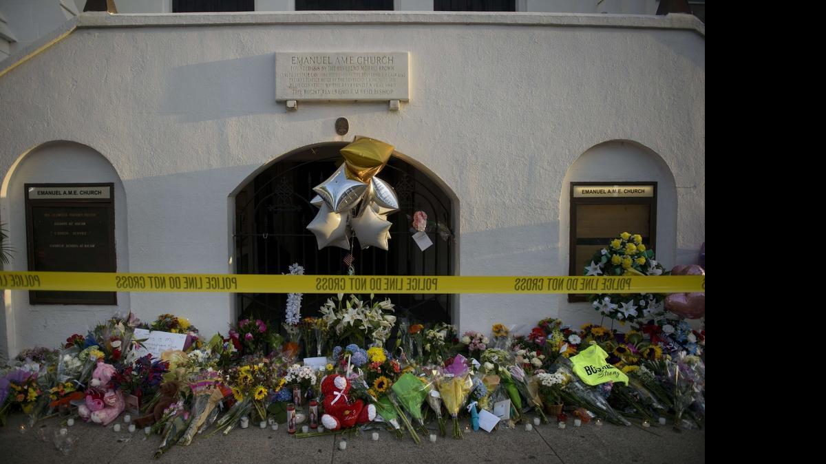 
A morning view of a memorial outside the Emanuel AME Church Friday in Charleston, South Carolina. Nine people were killed at the church during a bible study Wednesday night.
