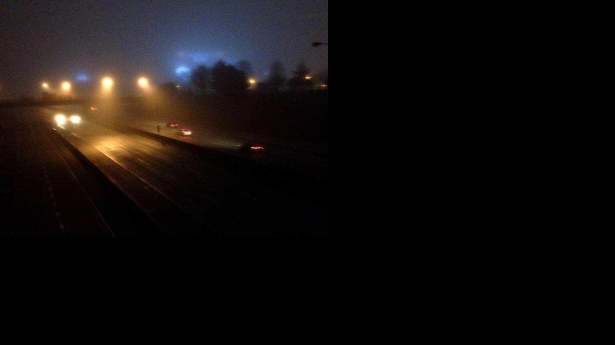 
Heavy fog hangs over Interstate 277 near Bank of America stadium in uptown Charlotte on Wednesday morning.


