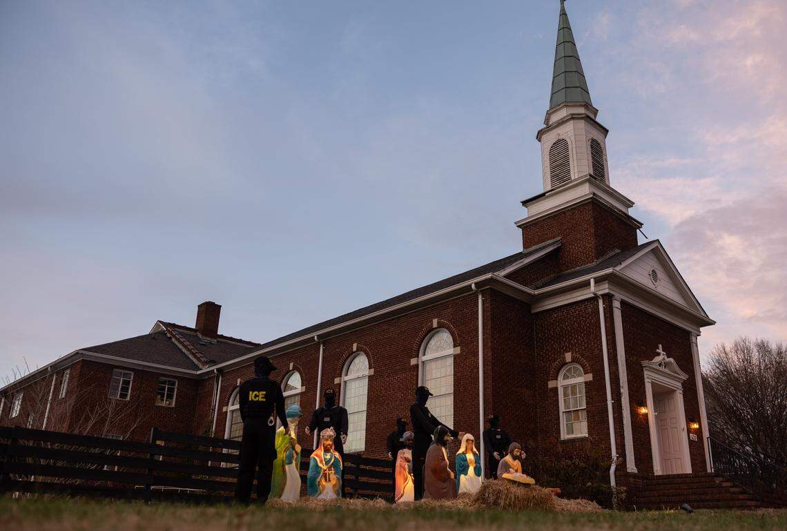A Nativity scene with an addition of mannequins dressed in ICE uniforms that appear to be making arrests outside of Missiongathering Church in Charlotte.
