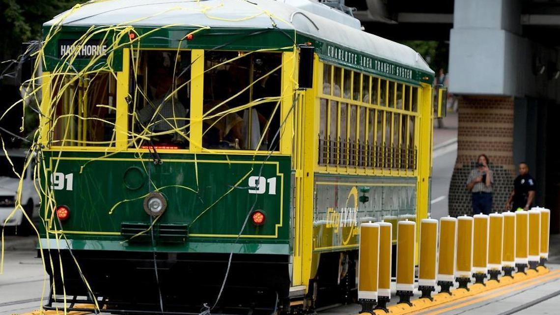 
Confetti hangs on Charlotte's first streetcar in 77 years following a ribbon cutting ceremony and inaugural ride on Tuesday, July 14, 2015.
