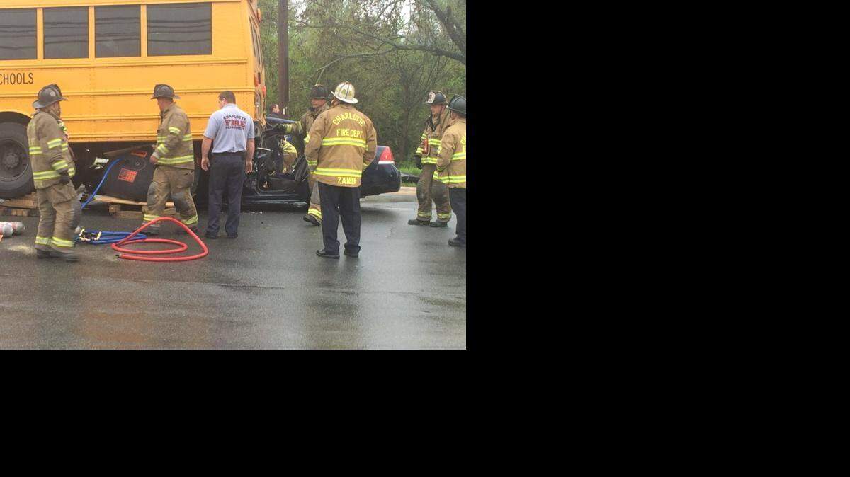 Officials respond to a wreck involving a car and a CMS bus Friday morning on West Boulevard. No students were hurt. One person has potentially life-threatening injuries, Medic said.