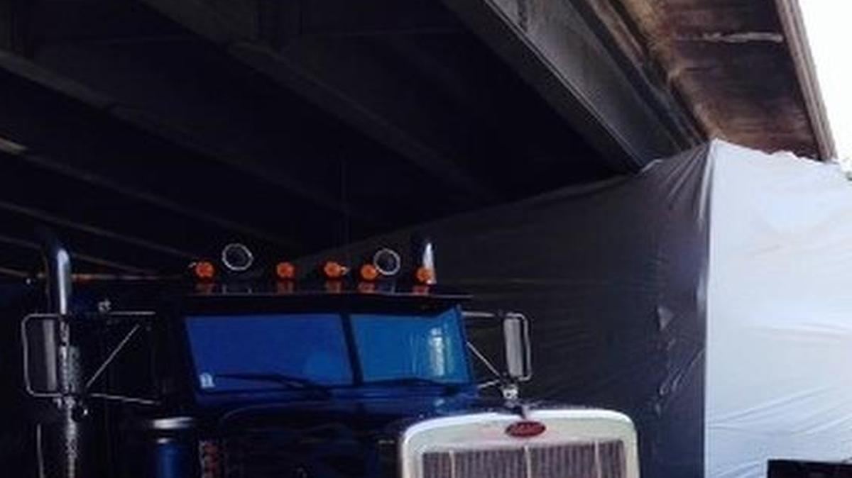 
A refrigerated truck headed to Texas became stuck under an I-85 overpass in Gaston County.
