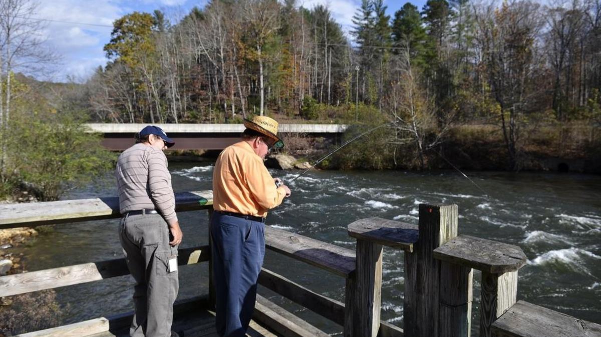 Anglers try their luck in the roiling waters of the Catawba River near Lake James.