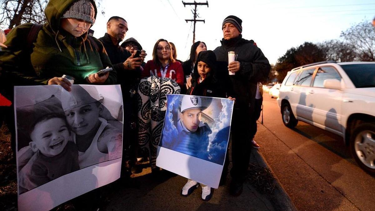 Family and friends gather near the location where Josue Javier Diaz, 28, was shot and killed by an undercover police detective on Albemarle Rd. in east Charlotte in January.