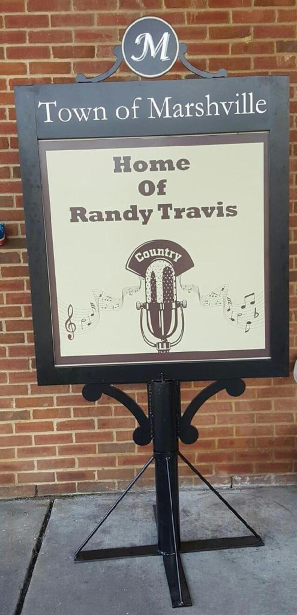 Photo of the new Randy Travis signs being erected outside Marshville, N.C.