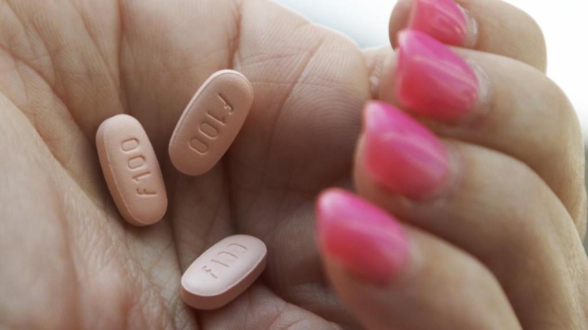 
Cindy Whitehead, CEO of Sprout Pharmaceuticals in Raleigh holds placebo examples of her company's ADDYI (flibanserin) pink pills Wednesday, August 5, 2015. Sprout may become the first to market the pill for women with hypoactive sexual desire disorder. Sprout has completed its latest round of trials and is awaiting a ruling by the US FDA (Food and Drug Administration) on whether Sprout can take the pill to market. 
