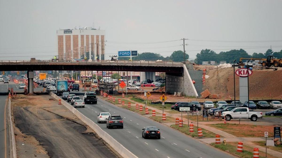 Construction is on hold on the overpass at Idlewild Road as the state awaits replacemenet of the project’s general contractor.