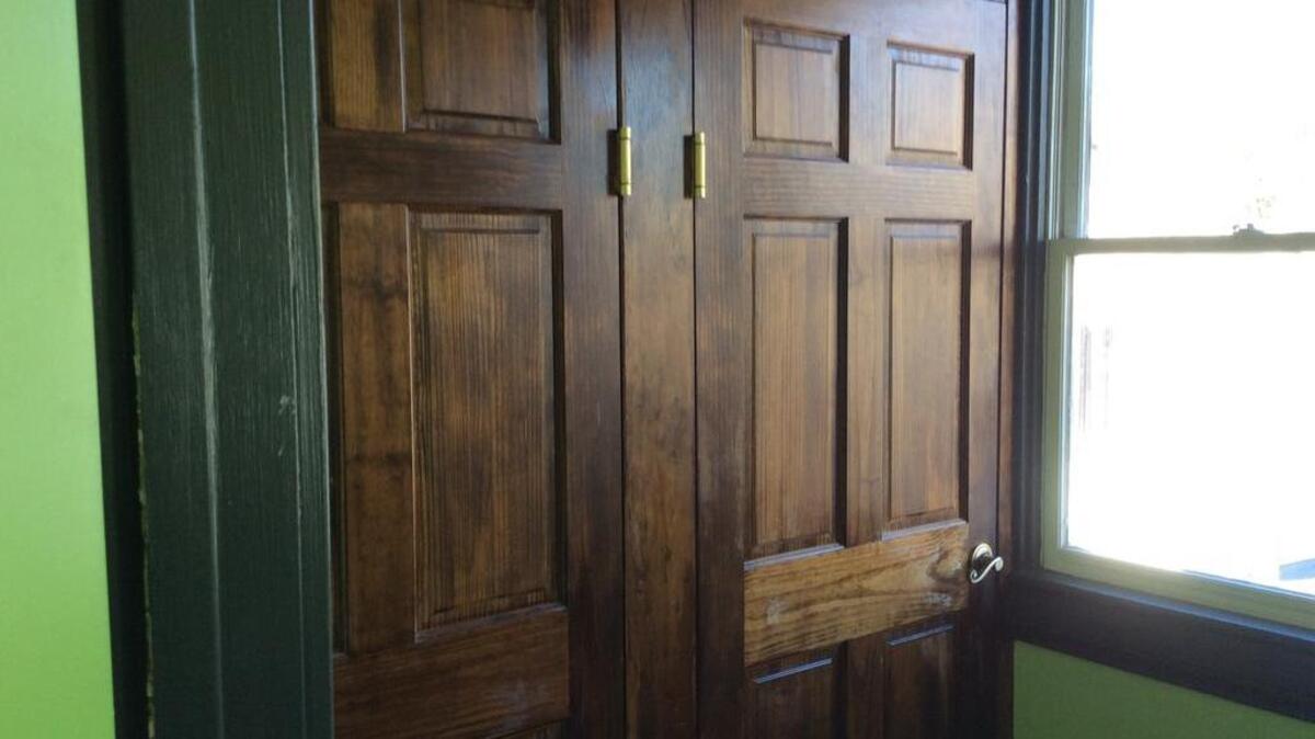 The gender-neutral bathroom at Pure Pizza in Plaza Midwood is adorned with two lockable stalls and a 8-foot-tall wall that separates them.
