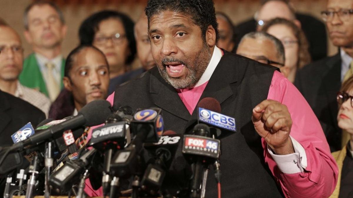 The Rev. William Barber speaks at a news conference last September after a second night of violence in Charlotte following the fatal police shooting of Keith Lamont Scott.