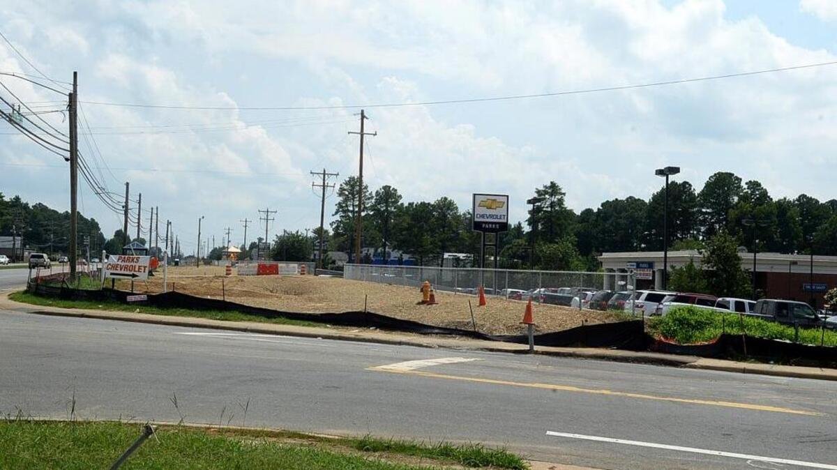 Clearing for the new Blue Line was already visible along N. Tryon Street at its intersection with Tom Hunter Road. Part of the intersection will be blocked until Feb. 24 for construction of the Blue Line Extension.