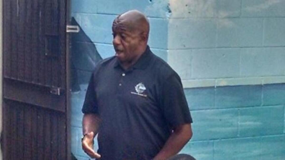 Garry McFadden, a retired homicide detective with the Charlotte-Mecklenburg Police Department, speaks at the forum Sunday night.