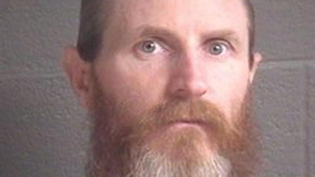Escaped inmate Michael Calloway, 42, assaulted a guard and fled during a medical procedure Wednesday in Asheville.