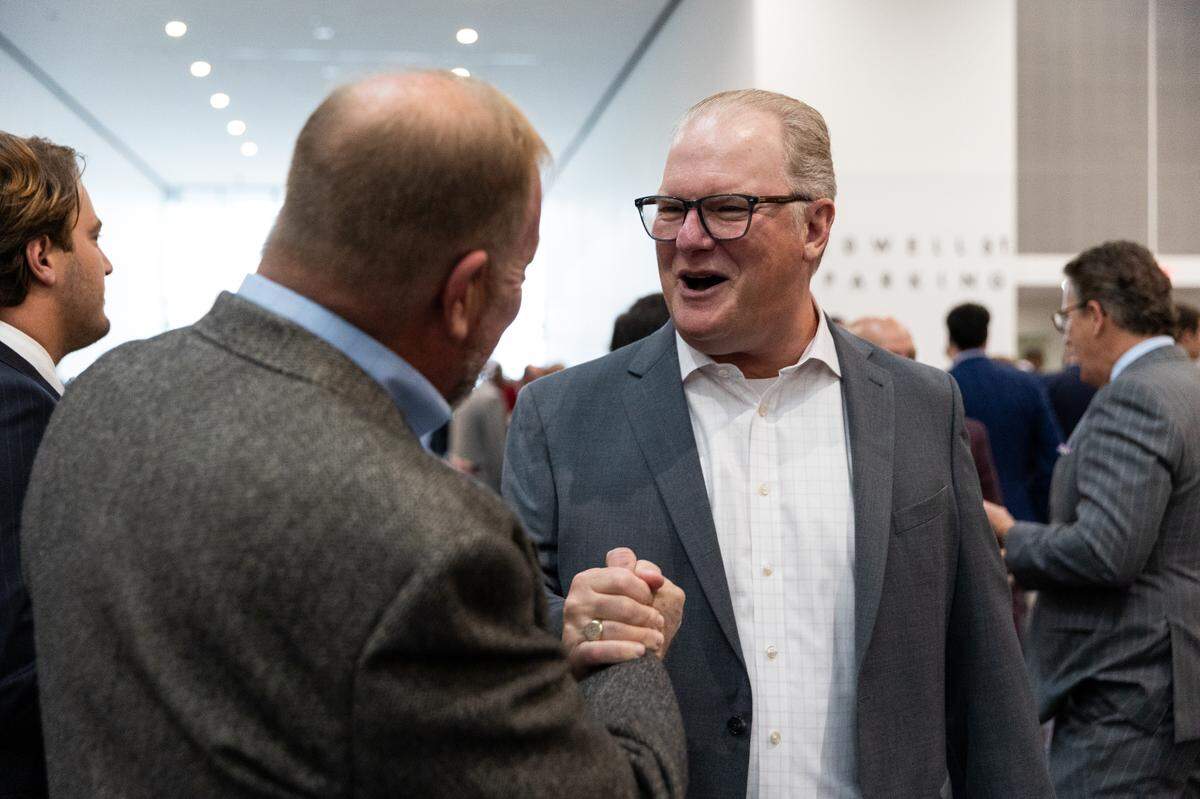 Guests mingle before the Good Fellows Luncheon at the NASCAR Hall of Fame.