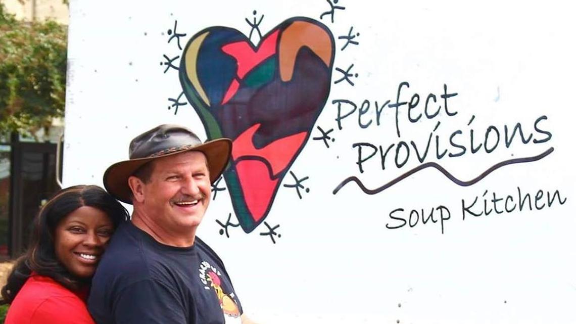 Barbara and Garry Wilder stand in front of the food truck they acquired in March to help with the meals they serve to the homeless and underprivileged.