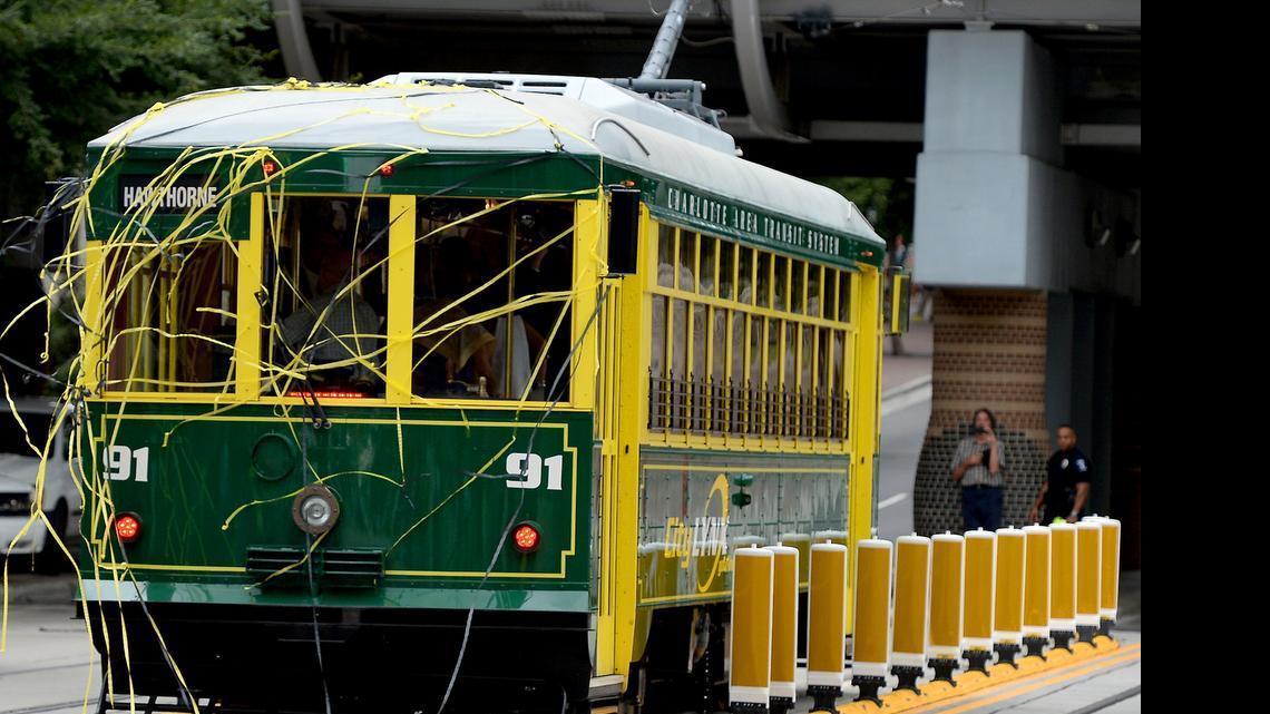 
Confetti hangs on Charlotte's first streetcar in 77 years following a ribbon cutting ceremony and inaugural ride on Tuesday, July 14, 2015.
