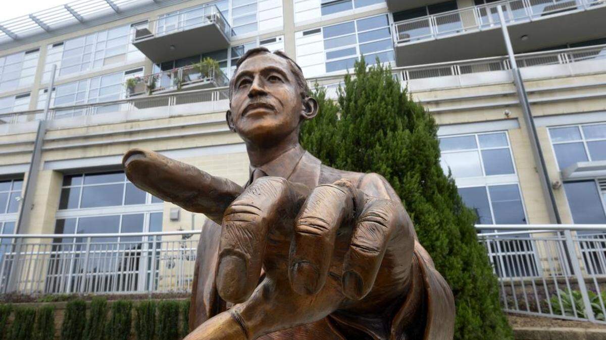 
A statue of Thad Tate by artist Ed Dwight just after being placed near the Metropolitan on the Little Sugar Creek Greenway, Monday, Oct. 5, 2015.
