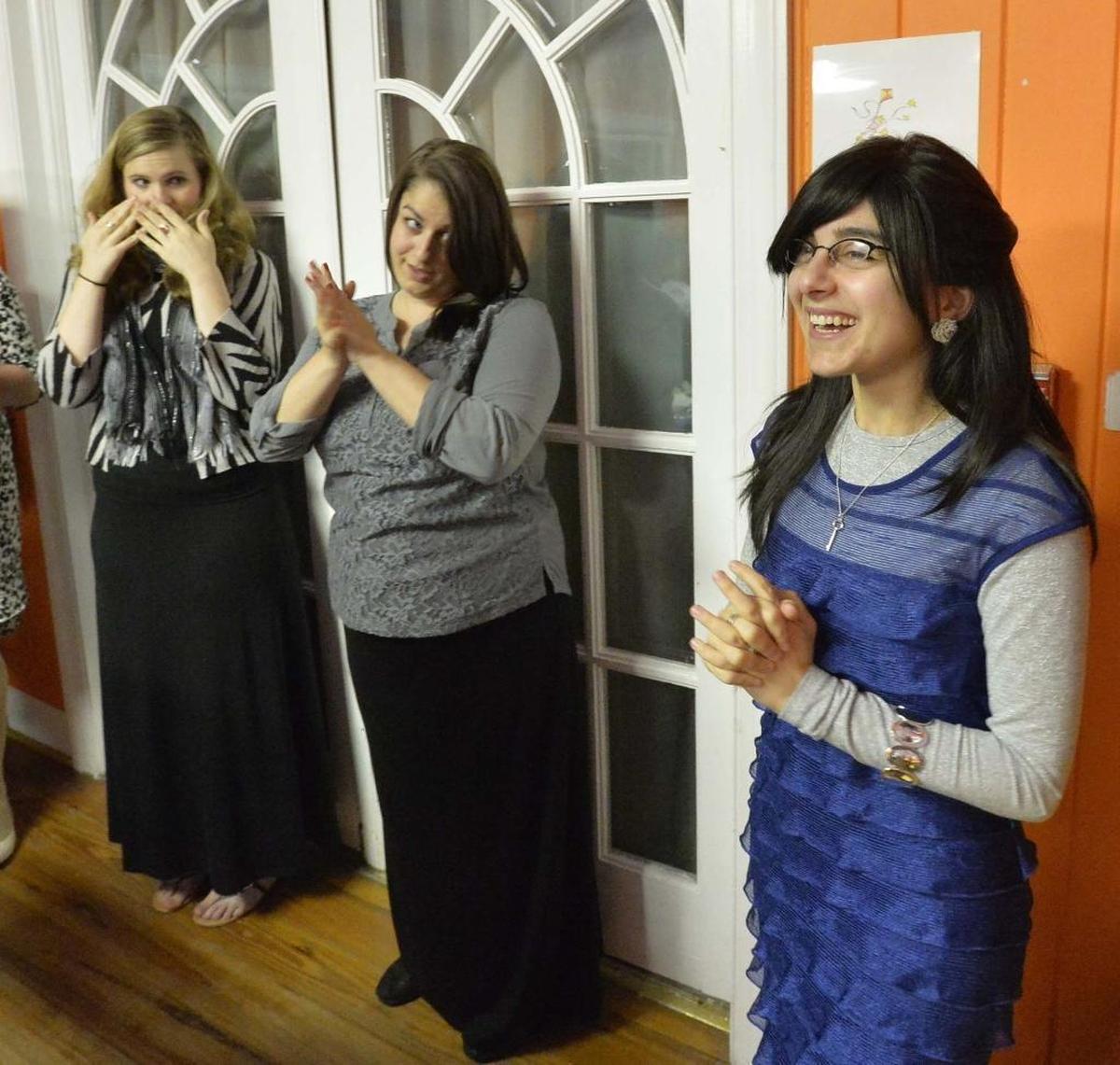 Rochel Groner(far right, pictured here in a 2014 photo) calmed a crying boy aboard a transatlantic flight.