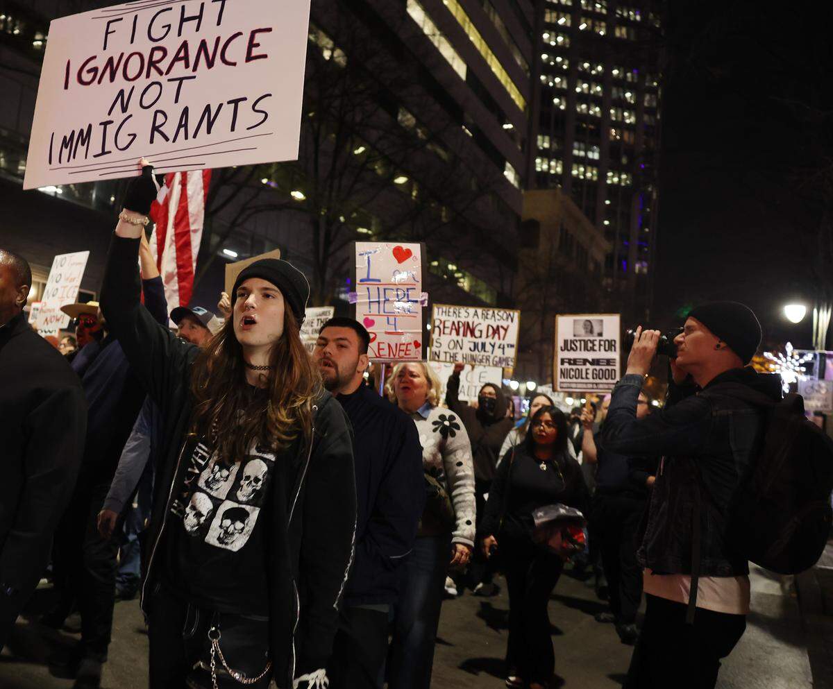 Protesters chant and march in uptown Charlotte Thursday, Jan. 8, 2026 to protest ICE after a woman was shot by an agent Wednesday in Minneapolis.
