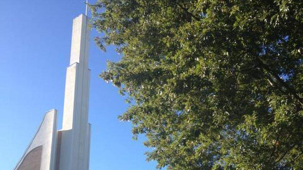 
The Rev. Kyle Thompson, senior pastor of Sharon United Methodist Church, stands in front of the church.
