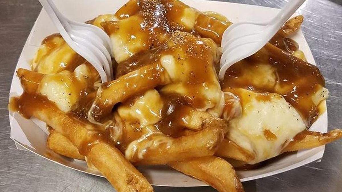 French fries with cheese curds and brown gravy is being served as the NC State Fair this year.
