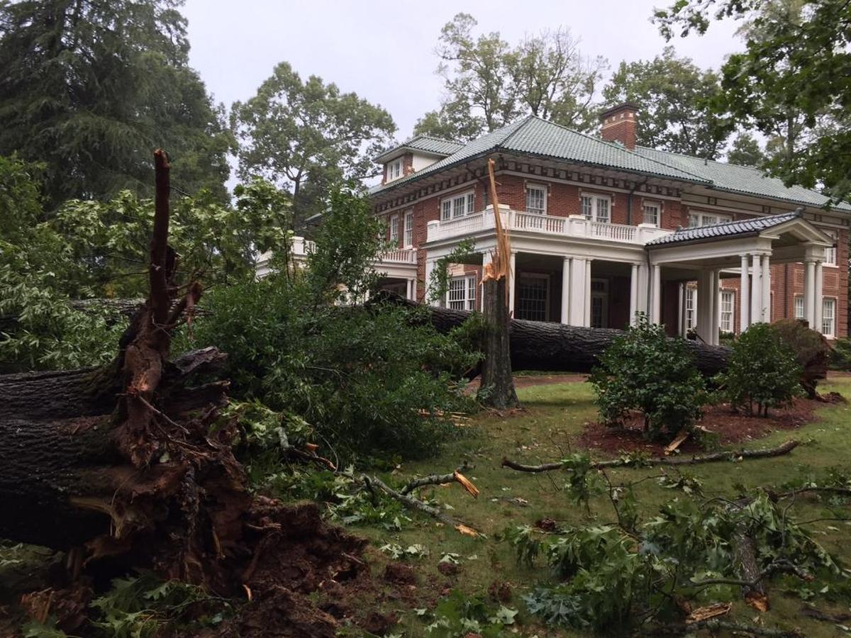 Rain and wind toppled two large oak trees at historic Stowe Manor in downtown Belmont. The trees did not damage the manor, which is used for weddings and other events. Parts of downtown Belmont remained without power Tuesday morning and Gaston County schools were closed.