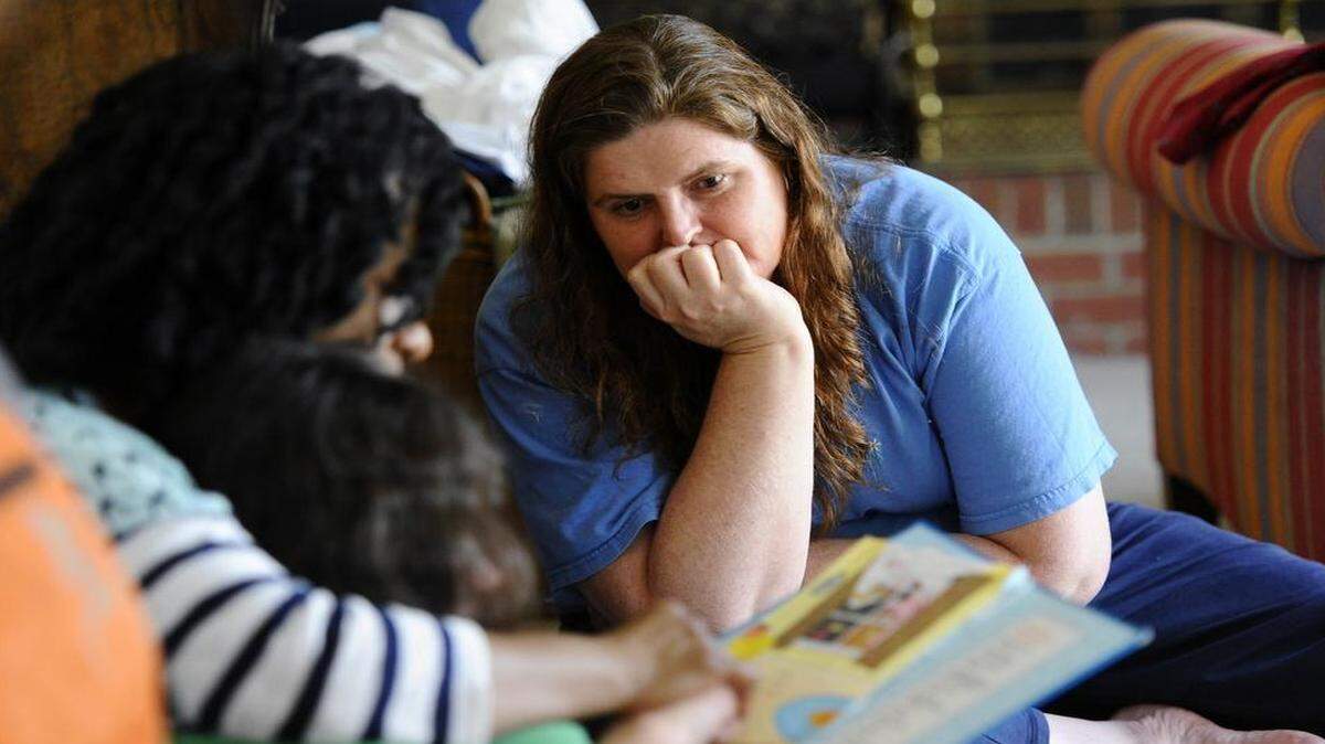 
Christy Koury, rear, says it’s her job to advocate for her 12-year-old daughter Bewlay, who has autism, while Cardinal Innovations has to keep an eye on controlling costs.
