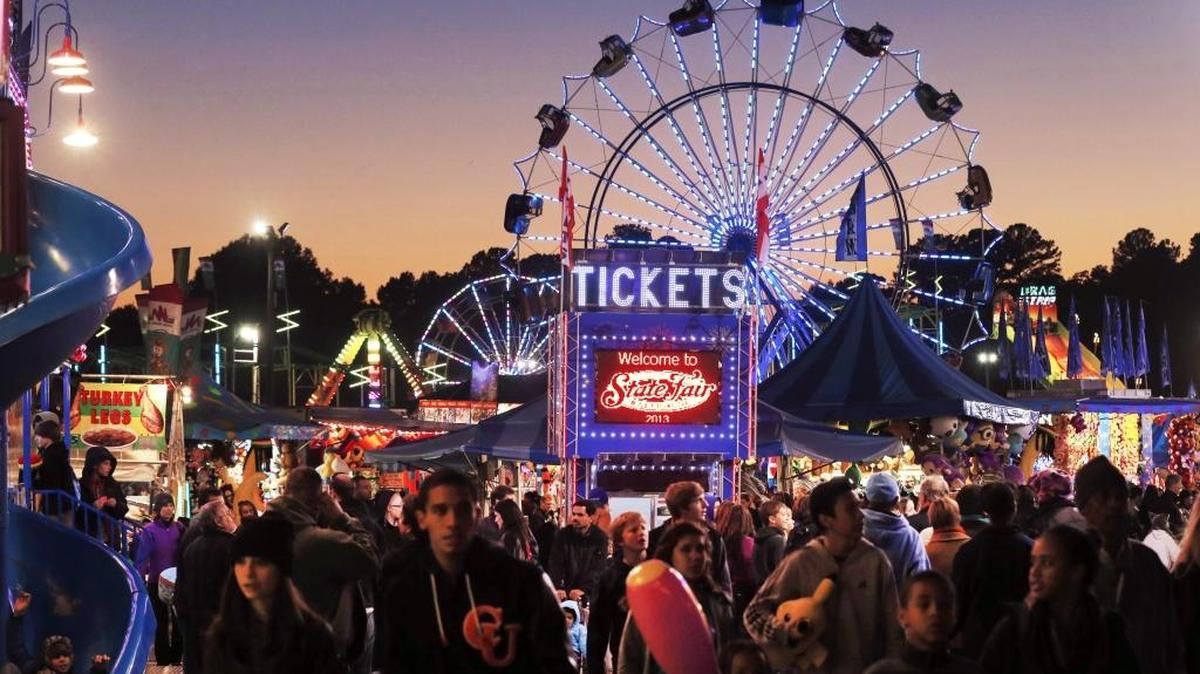 The sun sets during the N.C. State Fair Friday October 25, 2013, in Raleigh, N.C.