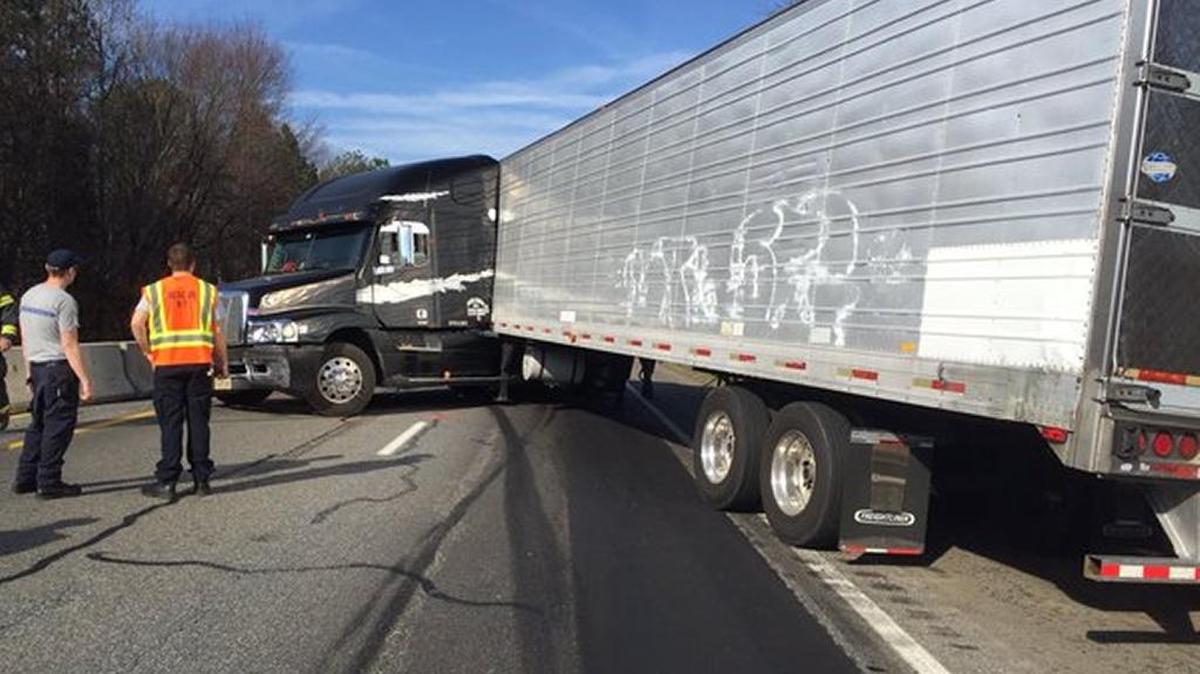 Northbound Interstate 77 is shut in Huntersville early Friday afternoon after a tractor trailer jack-knifed just north of the Gilead Road exit, firefighters said.
