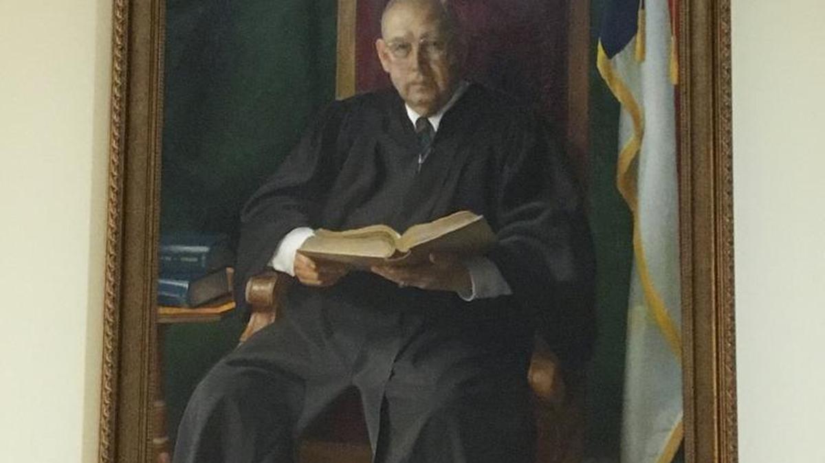 A portrait of longtime Mecklenburg Superior Court Judge Marvin Gray hangs on the sixth floor of the Mecklenburg County Courthouse.