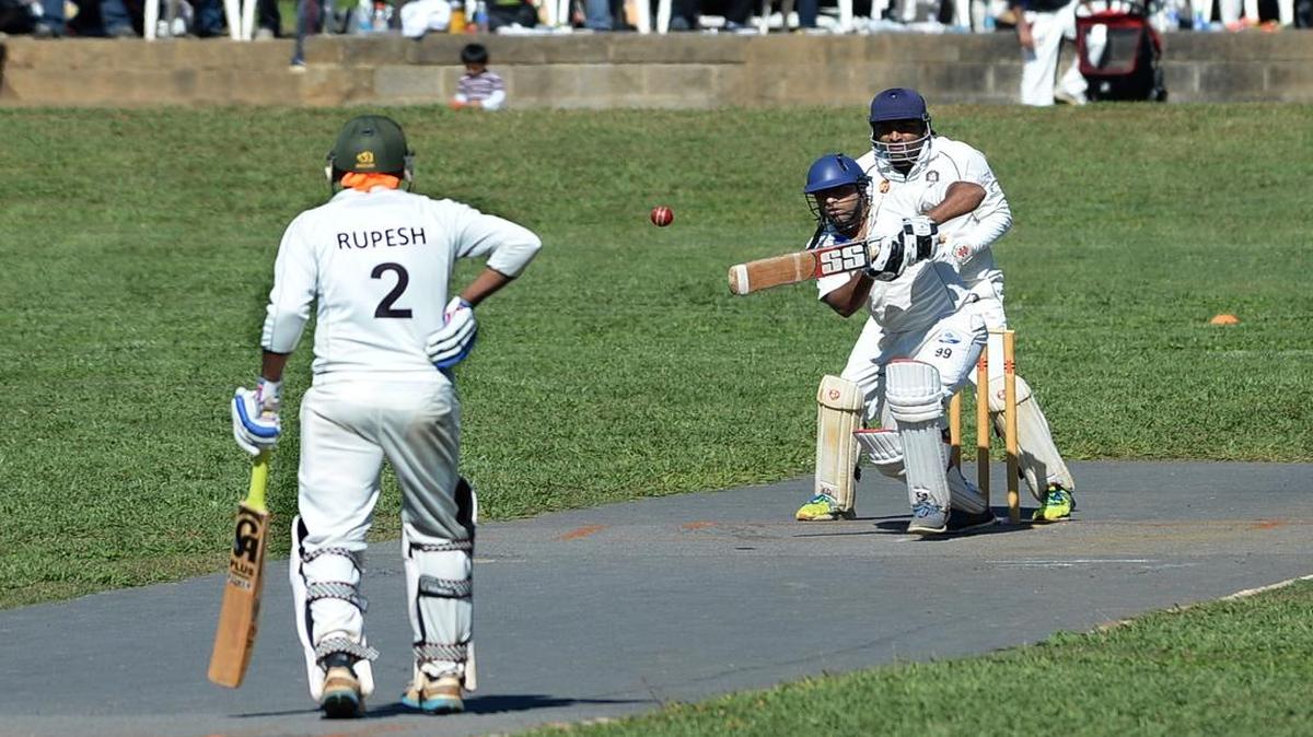 
Sunil Patel of South Park Cricket Club hits the ball during Sunday’s cricket match, fellow team batsman at left is Rupesh Raut. The Charlotte Lions Cricket Club entered finals competition Sunday for the Carolina Cricket League at its home ground at Lakhany Cricket Ground in Gastonia, N.C.
