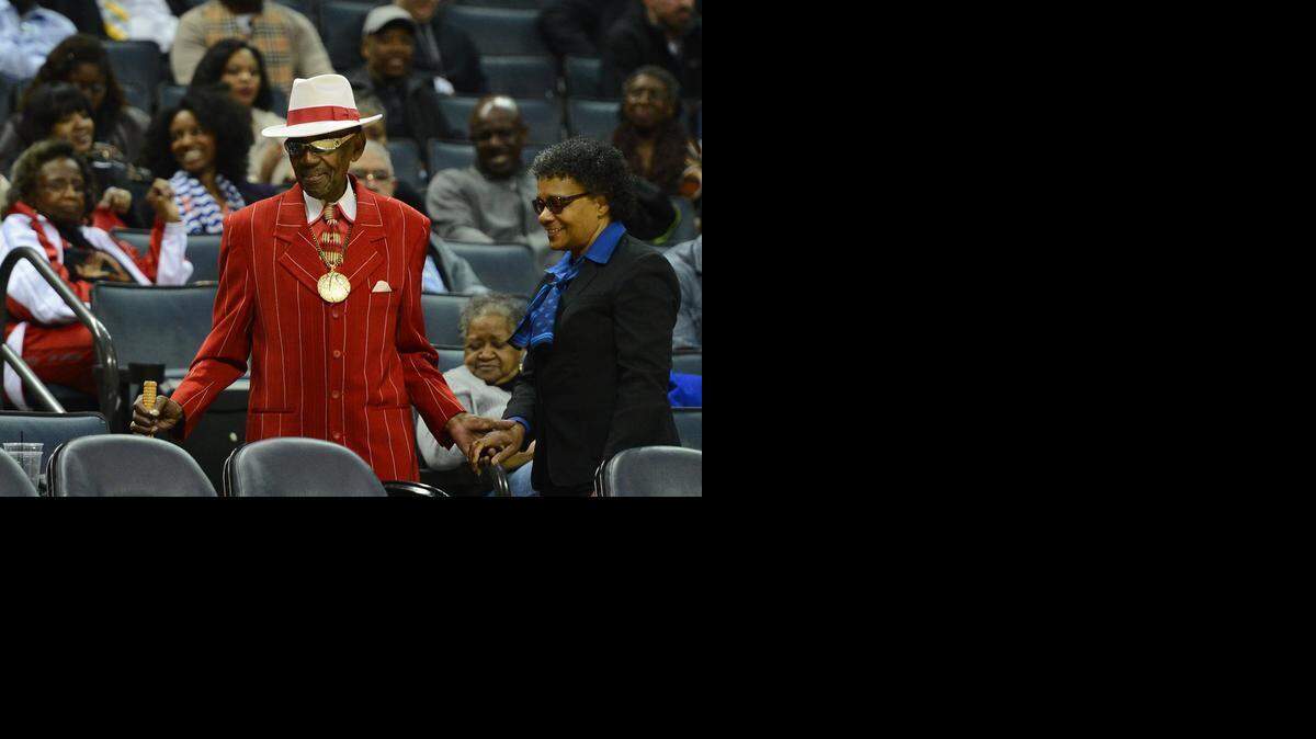 
Mr. CIAA, Abraham Mitchell makes his way through the stands at Time Warner Cable Arena during second half action between Johnson C. Smith University and Winston-Salem State University in 2014 CIAA Basketball Tournament action at Time Warner Cable Arena in Charlotte, NC on Friday, February 28, 2014. 
