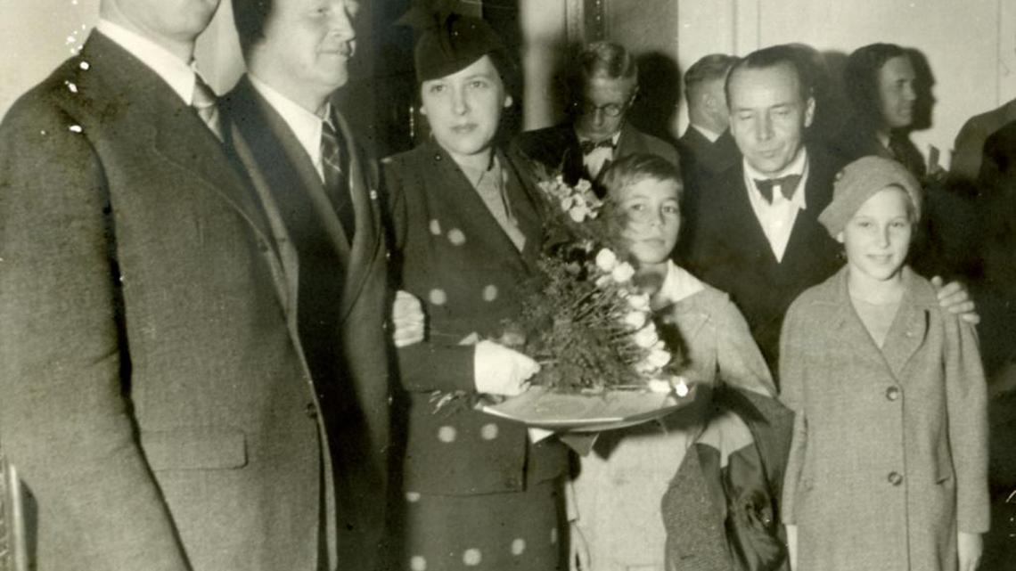 A celebration was held in 1936 as Frances Springs was honored as the 1,000th passenger to cross the Atlantic Ocean on the Hindenburg. Daughter Anne Springs Close is far right.