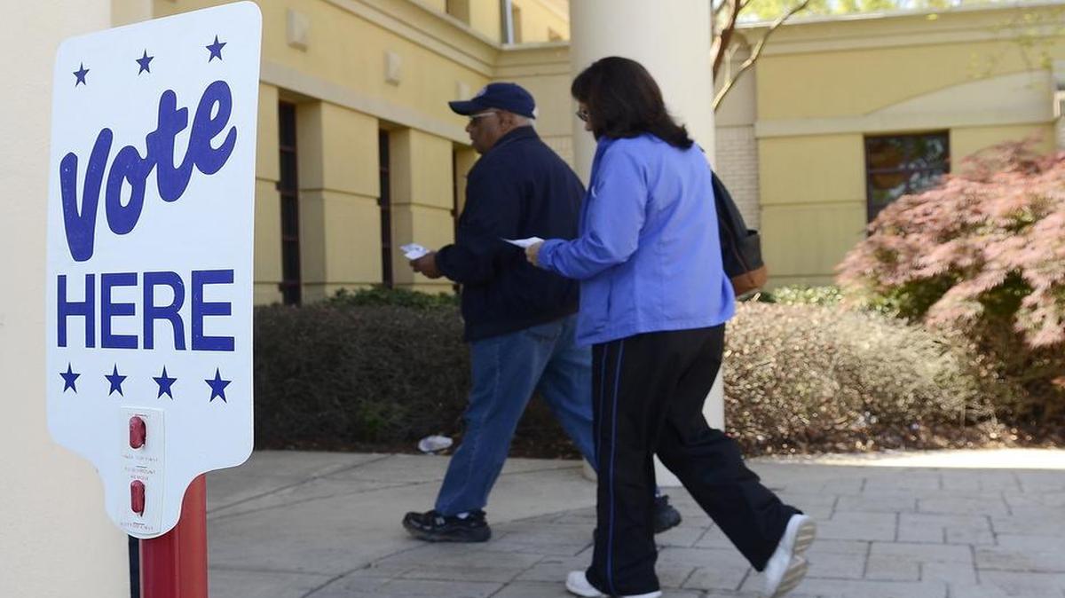Voters enter a Charlotte polling place.