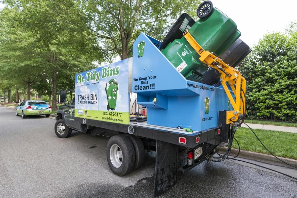 Mr Tidy Bins uses arms similar to the city’s trash pickup to dunk garbage cans into a solution of recycled water, where they receive a pressurized jet spray, then a final sweeping out if the can is extra dirty.