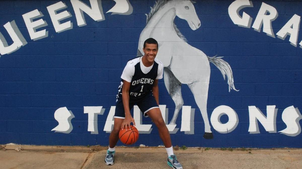 At 6-foot-9, Patrick Tape is playing a big role for the Queen’s Grant basketball team.