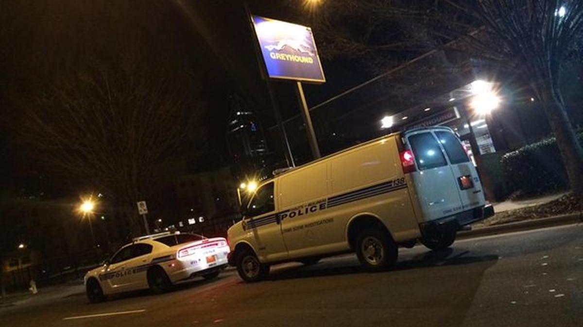 A security guard and another person were stabbed early Thursday at the Greyhound bus station in uptown Charlotte.
