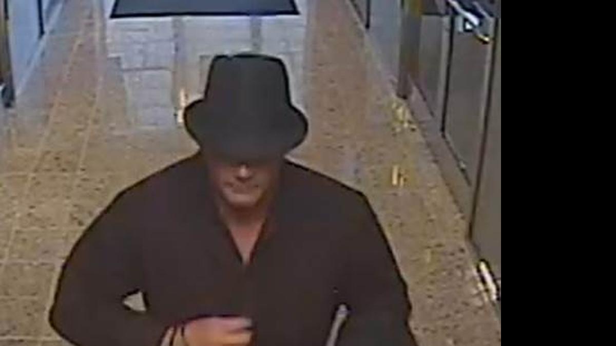 
Charlotte-Mecklenburg police are asking for the public’s help in identifying this man police said robbed a jewelry business in the 5900 block of Fairview Road at gunpoint Monday.

