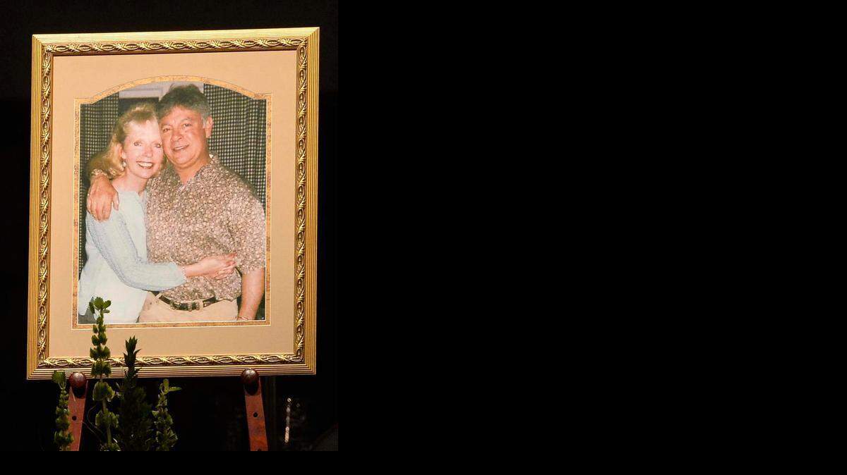 
 A portrait of Doug and Debbie London on stage during their funeral service Oct. 29.
