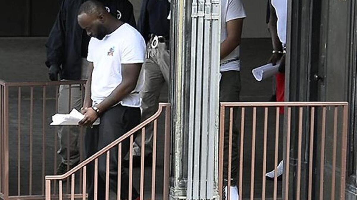 Suspected members of the United Blood Nation gang leave the federal courthouse in Charlotte after they were indicted last week. Of the 83 indicted, 79 were listed in court documents with gang nicknames.