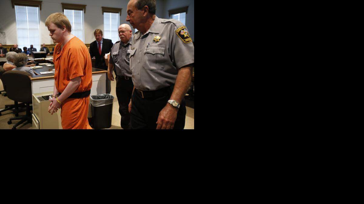
Clayton Eli Watts pleaded guilty to murder Wednesday in connection with the 2013 murder-for-hire plot that resulted in the shooting death of his grandmother. Watts is escorted from the courtroom after the guilty plea.
