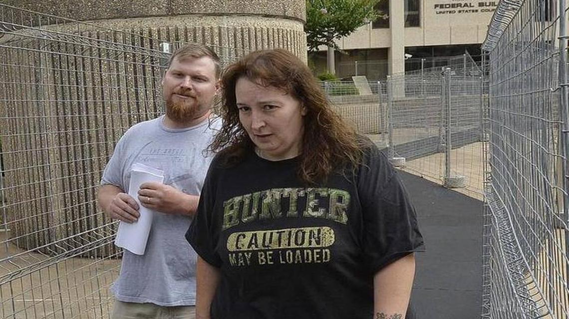 Sandy Parsons, left, and Casey Parsons leave the federal courthouse in Winston-Salem in July 2014 after they were charged with tax evasion and other crimes.