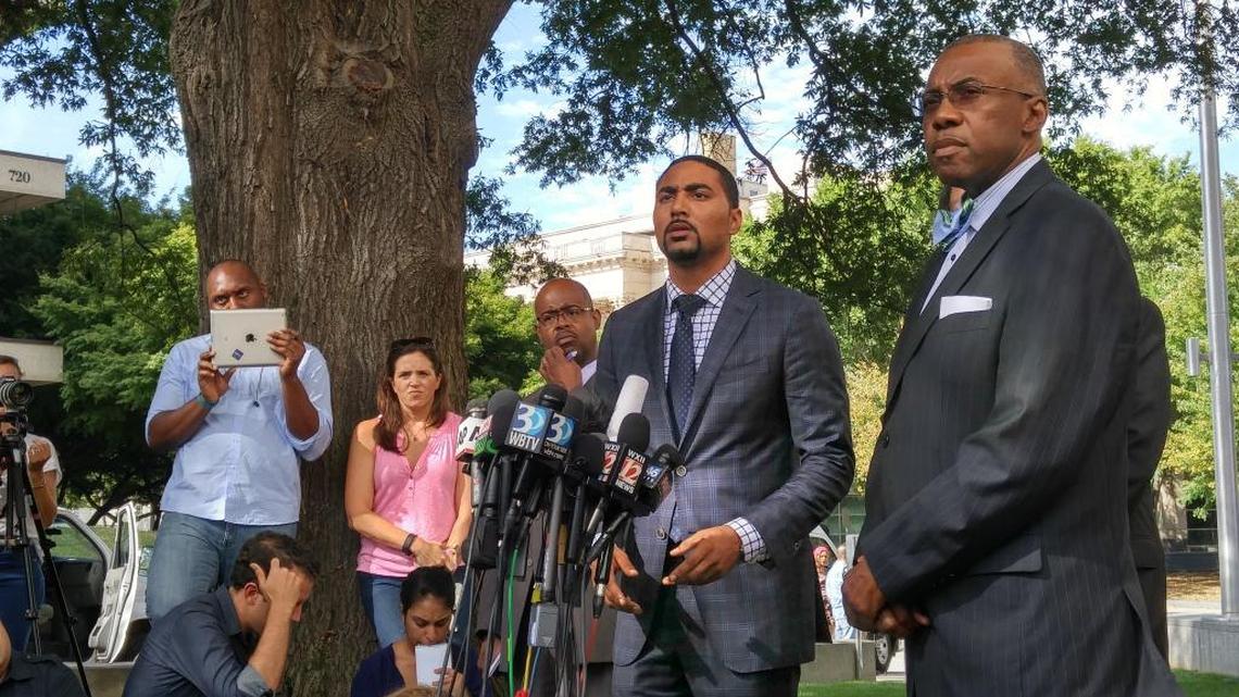 Attorney Justin Bamberg, who is representing the family of Keith Lamont Scott, speaks to the media Thursday afternoon. To Bamberg’s right is attorney Eduardo Curry, who is also representing the family.