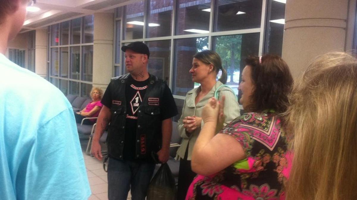 
Jason Thatcher with family and friends after being released from jail in 2013. Police dropped the charges, saying he didn’t rob the Rock Hill CVS.
