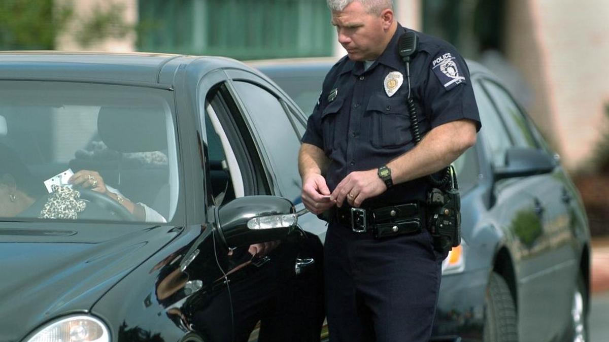 2007 file – Officer G.T. Gale III of the Charlotte-Mecklenburg Police Dept. stops a woman after radar indicated she was speeding on Independence Blvd. in Charlotte.